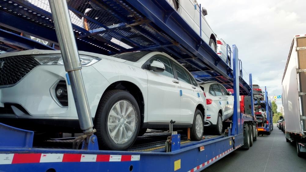 Car transporter lorry loaded with new cars